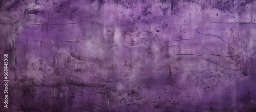 Dark purple cement wall with a rustic texture portrayed as a concrete backdrop