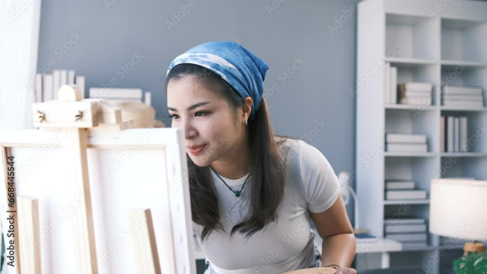 Young asian student sitting with still life painting at the studio Young asian student sitting with still life painting at the studio