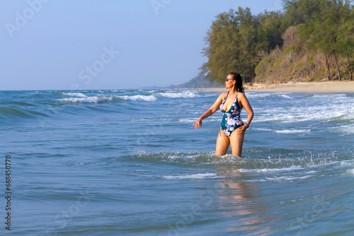 Woman body big with swimsuit relax at beach