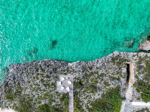 Tranquility Over Silly Creek, Providenciales, The rocky shoreline tells a story of ancient history. photo
