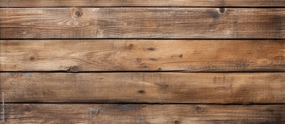 Naklejka premium Texture of an aged wooden plank background