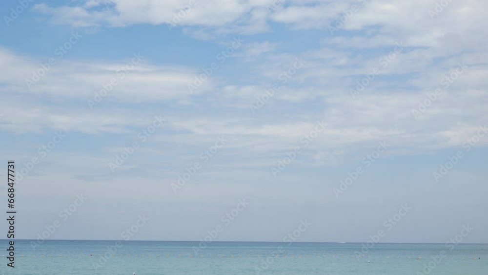 Beautiful tropical blue sky and white cloud over sea with wave and beach background. Summer vacation Beautiful tropical blue sky and white cloud over sea with wave and beach background. Summer vacation