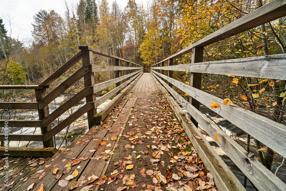 Small bridge over river in autumn Small bridge over river in autumn