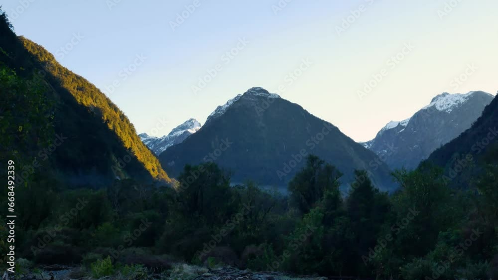 slow pan of ominous mountains in New Zealand's Fiordland slow pan of ominous mountains in New Zealand's Fiordland