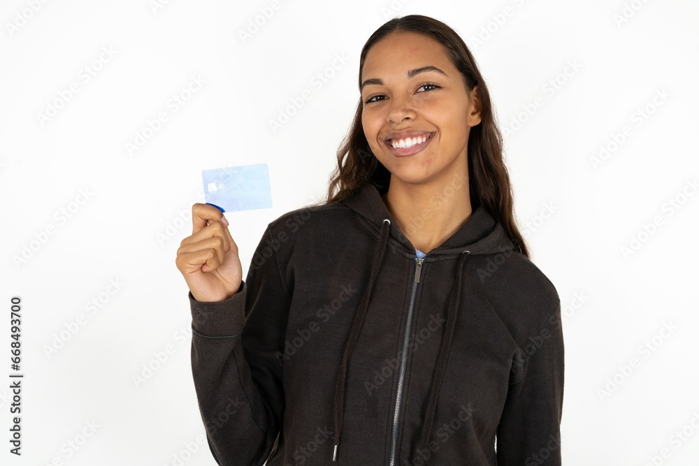 Close up photo of optimistic Young beautiful woman  hold card