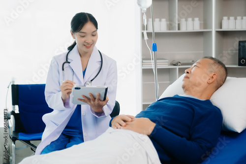 Doctors explaining the symptoms to a patient in a hospital or therapeutic treat client Professional medical service concept.