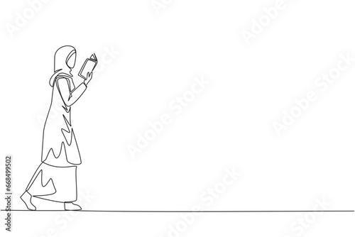 Continuous one line drawing Arab woman walking reading book. Gesture of memorizing something from a book. Read anywhere. Addicted to reading. Book festival. Single line draw design vector illustration