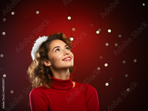Young attractive woman wearing santa claus hat looking at copy space for advertising promo for new year