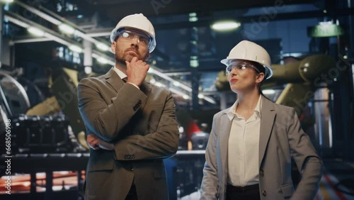 Wallpaper Mural Production owners inspect factory premises in protective helmets close up. Torontodigital.ca