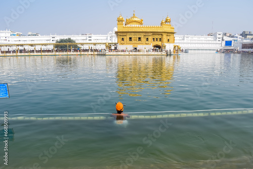 Beautiful view of Golden Temple (Harmandir Sahib) in Amritsar, Punjab, India, Famous indian sikh landmark, Golden Temple, the main sanctuary of Sikhs in Amritsar, India photo