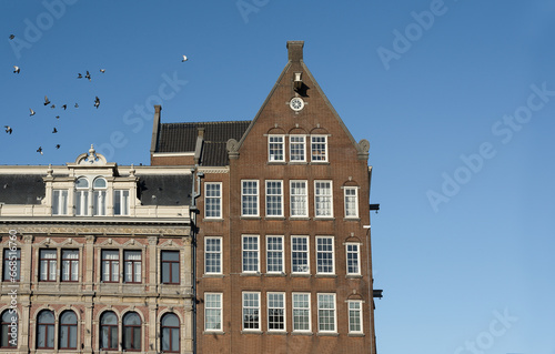 Traditional Dutch Baroque and Gothic old architecture in Amsterdam from 17th century.