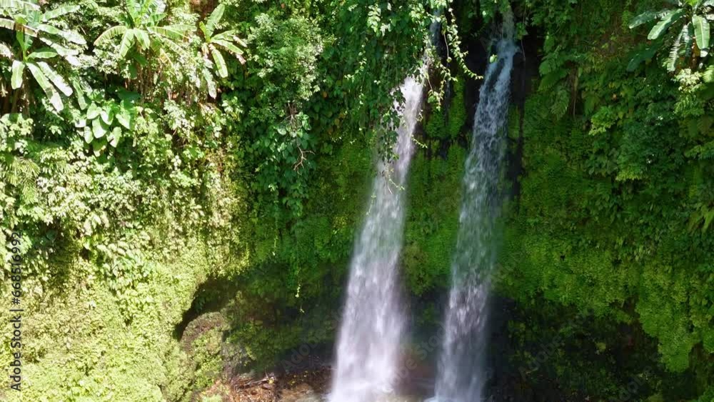 Zooming Out Revealing Waterfalls In Lush Tropical Jungle in the Philippines Zooming Out Revealing Waterfalls In Lush Tropical Jungle in the Philippines