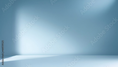 Minimal abstract simple light blue background for product presentation. Shadow and light from windows on plaster wall.
