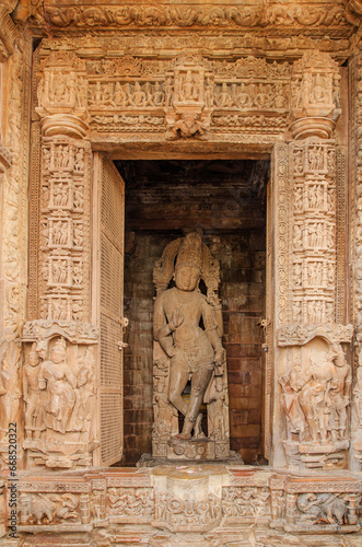 Beautiful sculpture of Chaturbhuja Vishnu at Chaturbhuja Temple, Khajuraho, Madhya Pradesh, India, Asia. photo