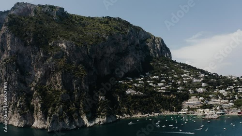 Wide aerial view of Capri, Italy's beautiful shoreline. photo