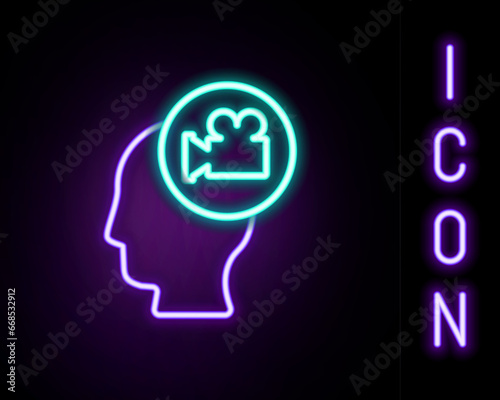 Glowing neon line Head with camera icon isolated on black background. Video camera. Movie sign. Film projector. Colorful outline concept. Vector