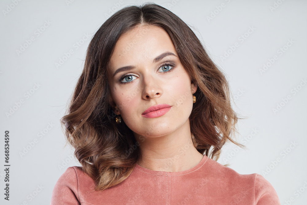 Cute woman brunette with clean fresh healthy skin. Portrait of beauty female model with natural makeup. Face close up Cute woman brunette with clean fresh healthy skin. Portrait of beauty female model with natural makeup. Face close up