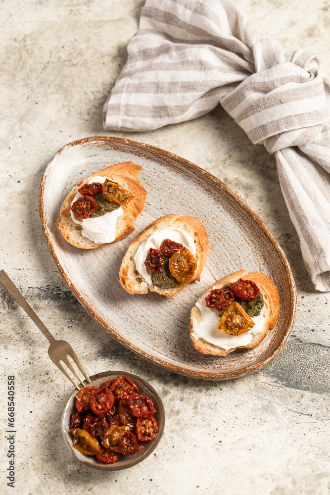 Fototapeta premium Bruschetta with sun-dried tomatoes, appetizer
