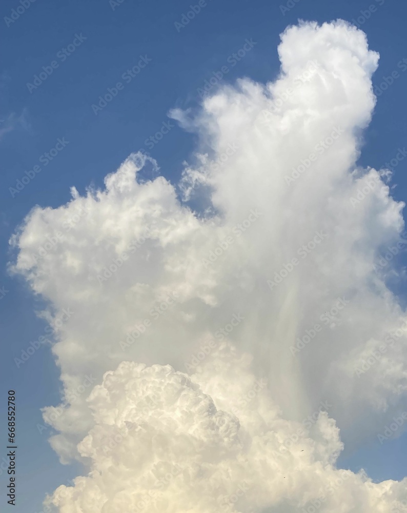 Blue sky with white and high cumulus cloud for background or illustration
