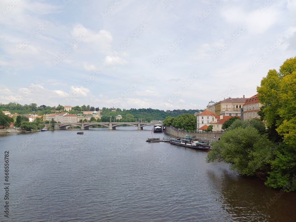 View of Vltava river at Prague city, Czech Republic with Manes bridge in background.