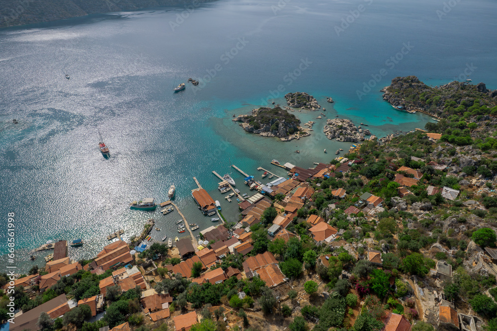 Aerial view of Simena castle and fishing and tourist village Kaleucagiz and Kekova sunken city. Tourist and travel destinations in Turkey