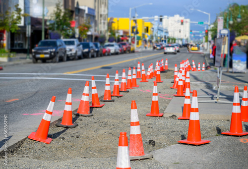 Orange traffic cones on the road. Roadworks in downtown Anchorage. Alaska. photo