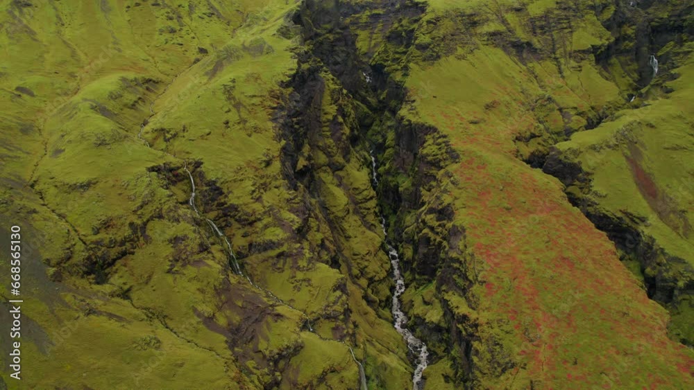 Volcanic canyon covered by moss in Icelandic highlands. Aerial Volcanic canyon covered by moss in Icelandic highlands. Aerial