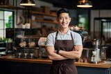 Confident asian men cafe owner standing at his coffee roastery