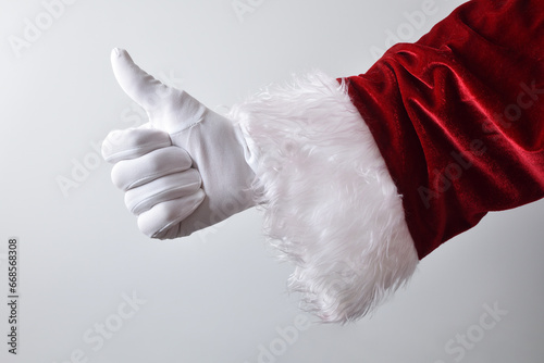 Santa claus hand making gesture ok isolated white