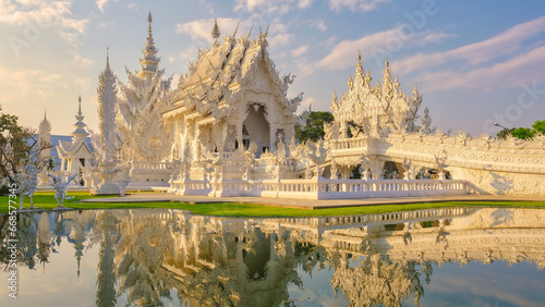 White temple Chiang Rai during sunset, view of Wat Rong Khun or White Temple Chiang Rai, Thailand