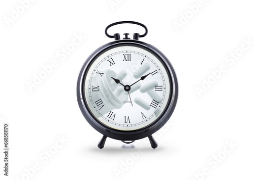 Pill time, classic black alarm clock with white dial with the illustration of a pill bottle from which several pills shoot out on a white background.
