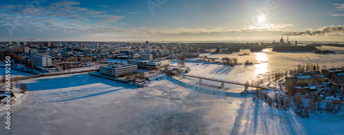 Oulu city. Pikisaari island and bridge at wintertime, Finland