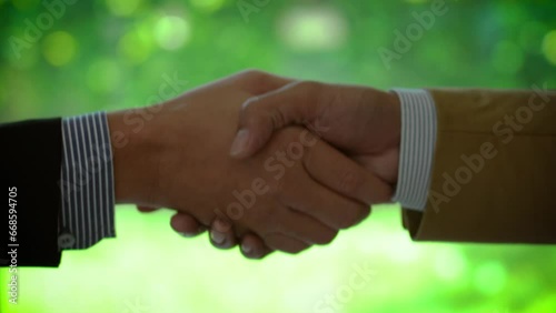 business cooperation holding hands people