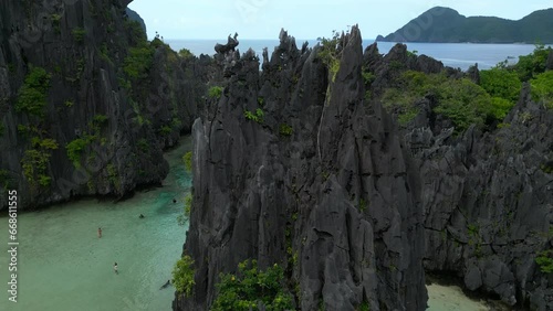 Aerial view of a sharp rock in a lagoon in the Philippines