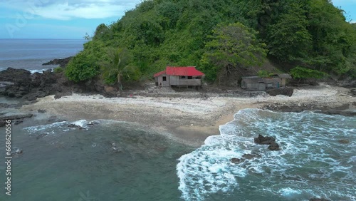 Lonely fisherman's house lost in the middle of the ocean in southeast asia