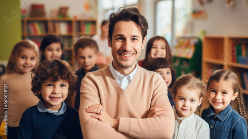 portrait of a kind male Montessori kindergarten teacher in a kindergarten with children, slight smile, candid