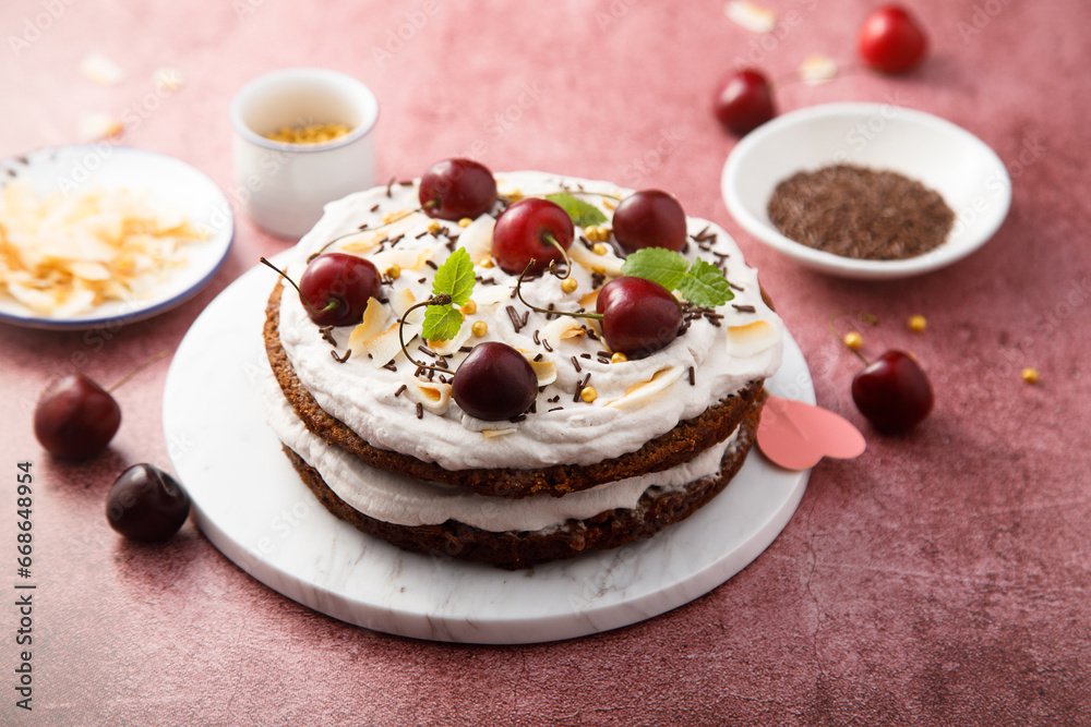 Homemade chocolate cake with coconut and cherry Homemade chocolate cake with coconut and cherry
