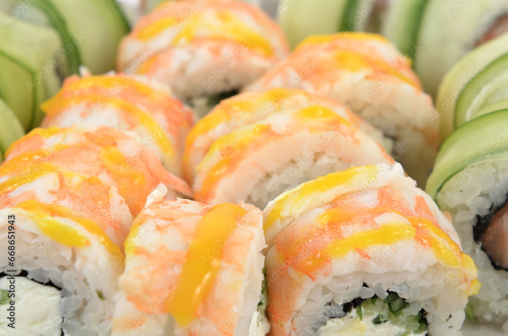 background of different sushi rolls background of different sushi rolls