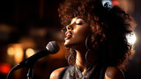 A beautiful young black American woman sings into a microphone. Pop singer, karaoke star.