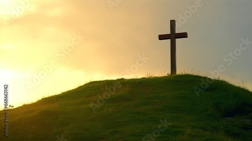 christian cross on top of mountain at sunset.