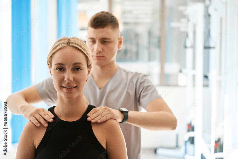 Pregnant woman has a consultation with a chiropractor Pregnant woman has a consultation with a chiropractor
