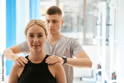 Pregnant woman has a consultation with a chiropractor