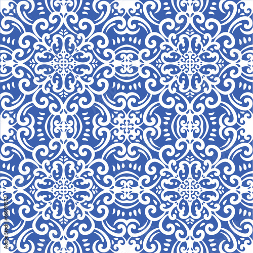 Pattern blue and white. Winter decor, snowflakes,christmas decor. Seamless pattern tile with Victorian motives.Ceramic tile in talavera style. Ornamental blue and white patterns for any decor.