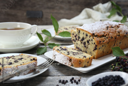 Summer baking. Black elderberry cake and cup of tea for summer tea party