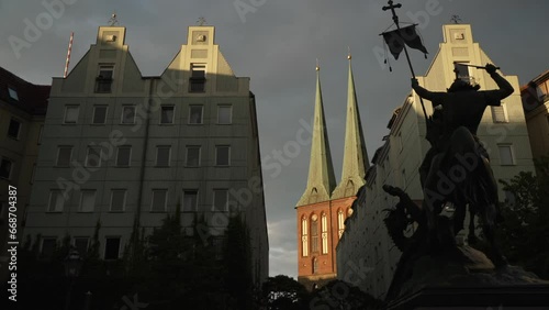 View of St. Nicholas Church and St. George The Dragonslayer at sunset, Nikolai District, Berlin photo