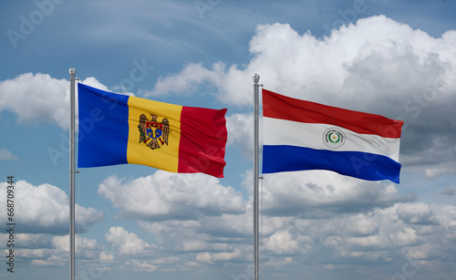 Paraguay and Moldova flags, country relationship concept