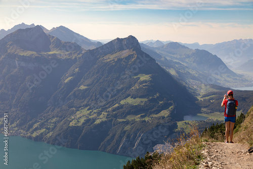Hiker in the mountains, Stoos, Schwyz, Switzerland 