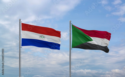 Sudan and Paraguay flags, country relationship concept photo