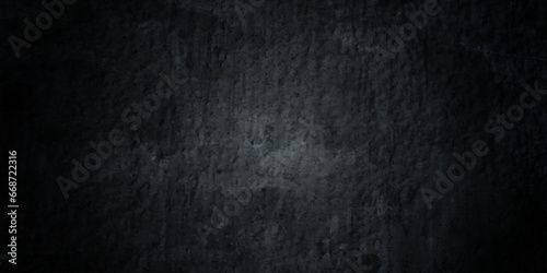 Natural Dark black concrete grunge wall texture background, and backdrop natural pattern. Stone black texture background. Dark cement, concrete grunge background texture. © MdLothfor