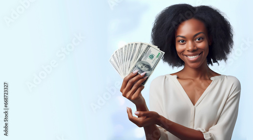 ¡Aquí está mi salario! Foto de primer plano de una joven con dinero en sus manos photo
